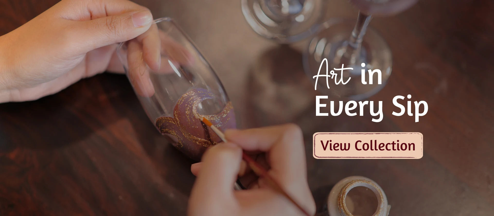 Hand painting a decorative champagne glass for personalised drink ware collection by Ekeha