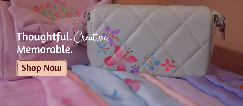 Hand painted floral handbag showcasing Ekeha handmade bags collection