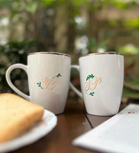 Personalised white ceramic mug with custom initials and leaf design by Ekeha