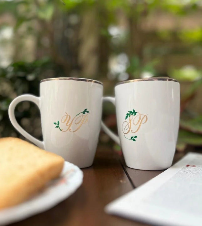 Personalised white ceramic mug with custom initials and leaf design by Ekeha