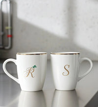 Set of 2 white ceramic mugs with gold rim and personalised initials R and S printed in elegant design